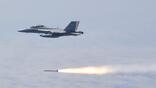 U.S. Navy  Caption: A F/A-18F Super Hornet fires an AARGM-ER missile during an early test flight.
