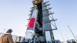 Caption: United Launch Alliance (ULA) hoists its Vulcan booster into the Government Vertical Integration Facility (VIF-G) adjacent to Space Launch Complex-41 at Cape Canaveral Space Force Station. The rocket will carry the USSF-87 mission for the U.S. Space Force Space Systems Command (SSC). Photo credit: United Launch Alliance