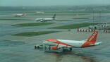 EasyJet aircraft on tarmac with Ryanair and Easyjet aircraft in background