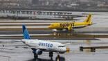 united and Spirit on tarmac