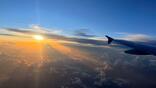 generic wing and sunset