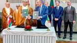 executives at the MOU signing
