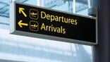 UK Departures Arrivals sign