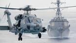 MH-60R and DDG-51 at sea