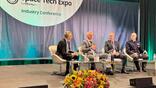 Aviation Week Defense & Space Executive Editor Robert Wall (left) moderates a space superiority panel with industry executives and Space Systems Command Deputy Commander Col. Andrew Menschner (right) at the 2026 Space Tech Expo on June 3, 2026, in Anaheim, California. Credit: Space Tech Expo // Informa 