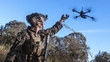 soldier launching a drone