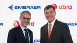 Abra and Embraer execs