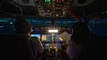 pilots in cockpit