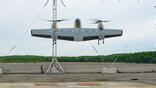 Art credit: Sikorksy Caption: Details of the Nomad 100 are blurred out in this photograph of the VTOL UAS flying