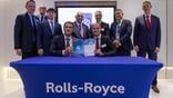 Rolls-Royce and Somon Air officials pose after signing the Trent 1000 XE agreement at Farnborough