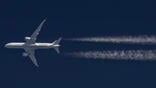 Air France aircraft with contrails