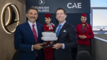 Turkish Airlines chairman Murat Şeker (left) and CAE president and CEO Matthew Bromberg at the CAE Farnborough chalet.