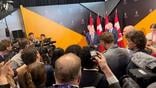 Pic caption: Prime Minister Mark Carney briefs the press during the Cansec exhibition in May.