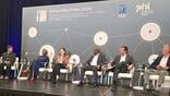 panelists on stage at the aci-ni in philadelphia