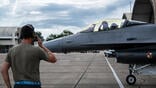 pilot saluting from an F-16