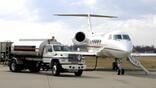 A business jet getting fuel 