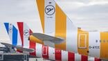 tails of three condor aircraft