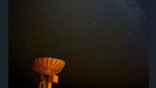 A Transmit Antenna at DARC Site 1 in Exmouth, Western Australia, is shown at night. Credit: Doug Humphries, BAE Systems