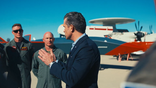 Defense Secretary Pete Hegseth speaks in front of a Boeing MQ-28 at NAS Point Mugu, California, in December 2025.