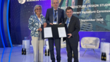 officials on stage at world space business week