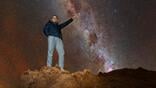 Philip Johnston pointing at Alpha Centauri.