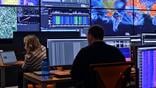 analysts work at computer stations