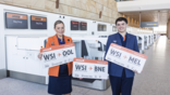 jetstar airport staff with oversized boarding passes from wsi to ool, bne, mel