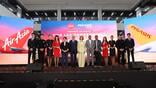 airline executives and crew onstage at pegasus and airasia partnership launch event