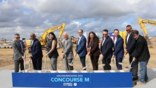 officials celebrating groundbreaking