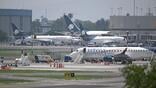 Aircraft on tarmac at Mexico City 's Benito Juarez International Airport