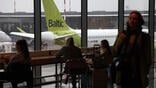 AirBaltic tail viewed from airport terminal