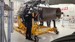 engineers working on aircraft engine