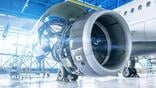 commercial aircraft engine exposed for maintenance inside hangar
