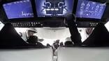 monitors and crew in spacecraft