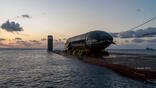 SpaceX Caption: The Starship spacecraft that flew on July 24 was loaded onto a semi-submersible ship on Aug. 25 near Christmas Island. It reached Starbase, Texas, on Oct. 7. 