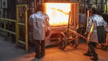 workers during the investment casting process