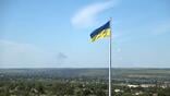 ukrainian flag waves in wind in kramatorsk, ukraine