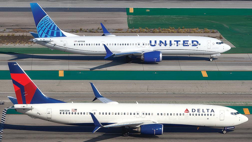 United Airlines jet and Delta Air Lines jet on runway