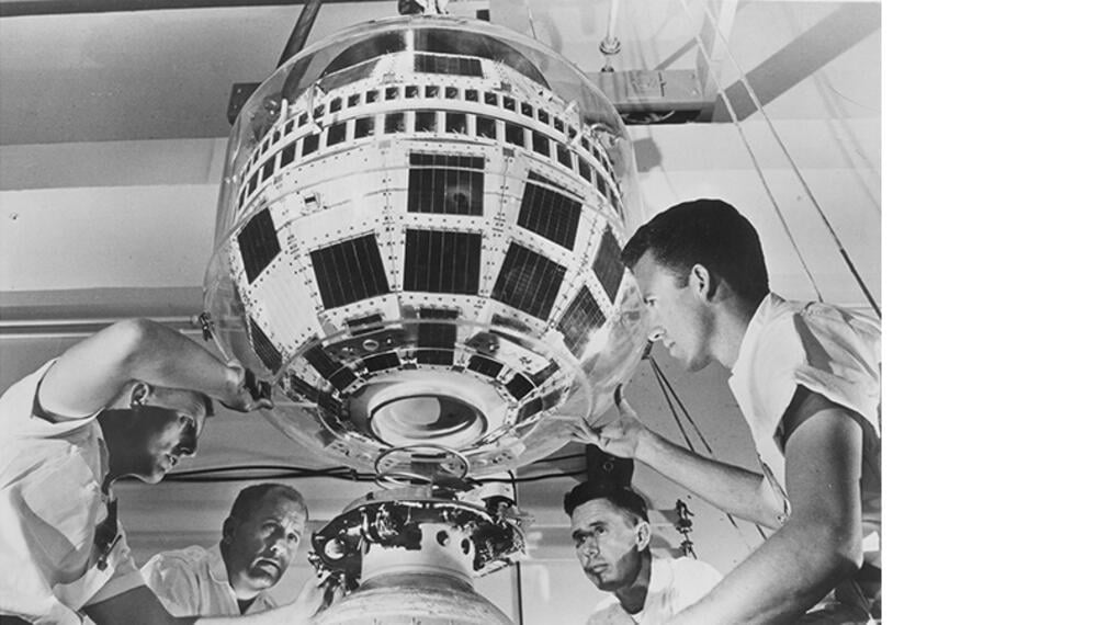 technicians working on Telstar satellite in 1962