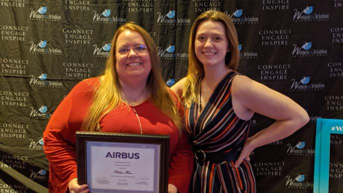 Rebecca Hines receiving the Airbus Women in Leadership Grant