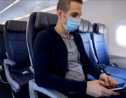 American Airlines passenger with mask