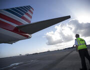 American Airlines pilot checking aircraft tail