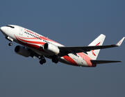 Ruili Airlines 737-700 taking off