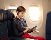 Delta Air Lines passenger working