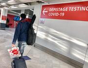 Paris Orly Airport sign to COVID-19 screening area 