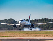 Delta A220 taking off