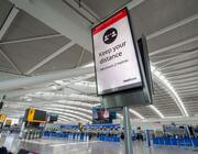 Heathrow Airport keep distance sign 
