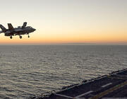 F-35 above aircraft carrier