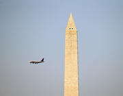 plane near Washington monument