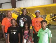 group touring local aircraft hangars